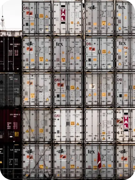 Stacked shipping containers in grid pattern Stacked shipping containers in grid pattern