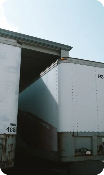 Truck backing into loading dock Truck backing into loading dock