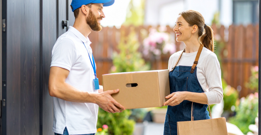 3 Delivery person handing over package in Clearwater