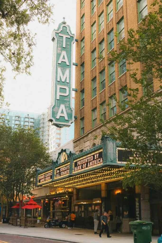 pexels-photo-17244610-17244610 Historic Tampa Theater facade with vibrant signage in downtown Tampa, Florida.